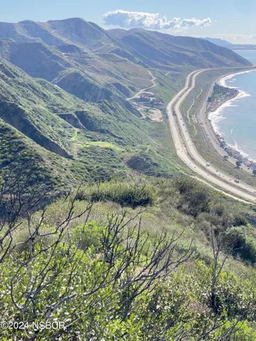 a view of a backyard of a house