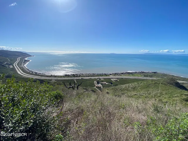 a view of a lake with a mountain