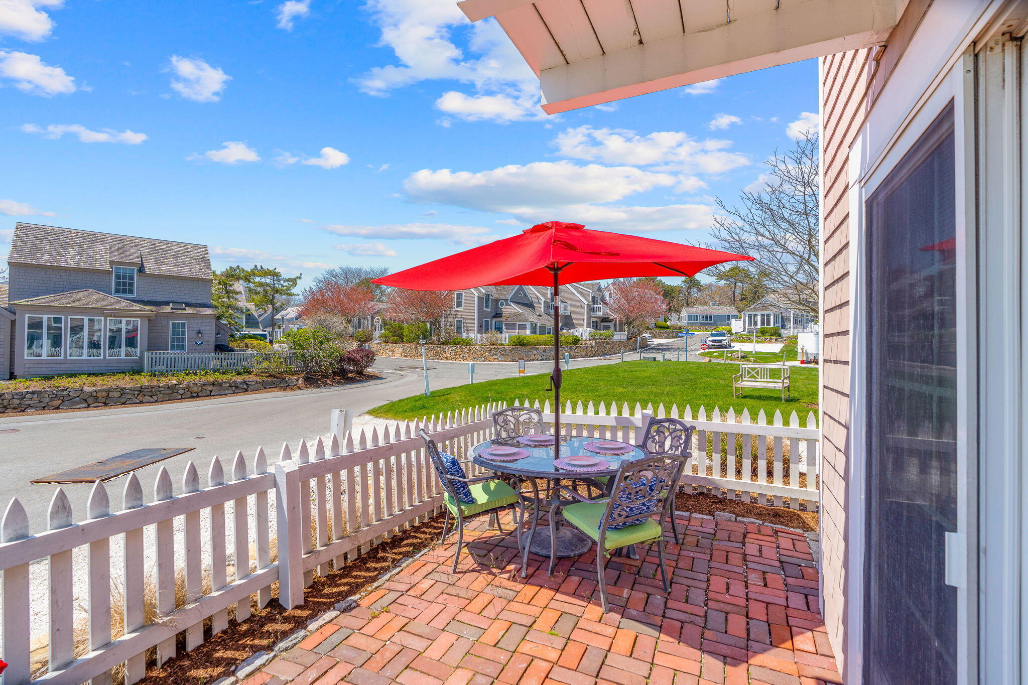 4 Race Point Road, Unit 4 Mashpee, MA 02649 - Photo 6 of 43 a view of a city from a patio