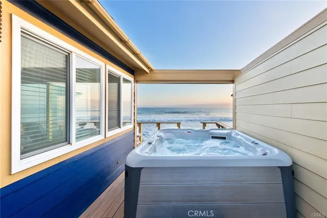 a view of sitting area with furniture and wooden floor