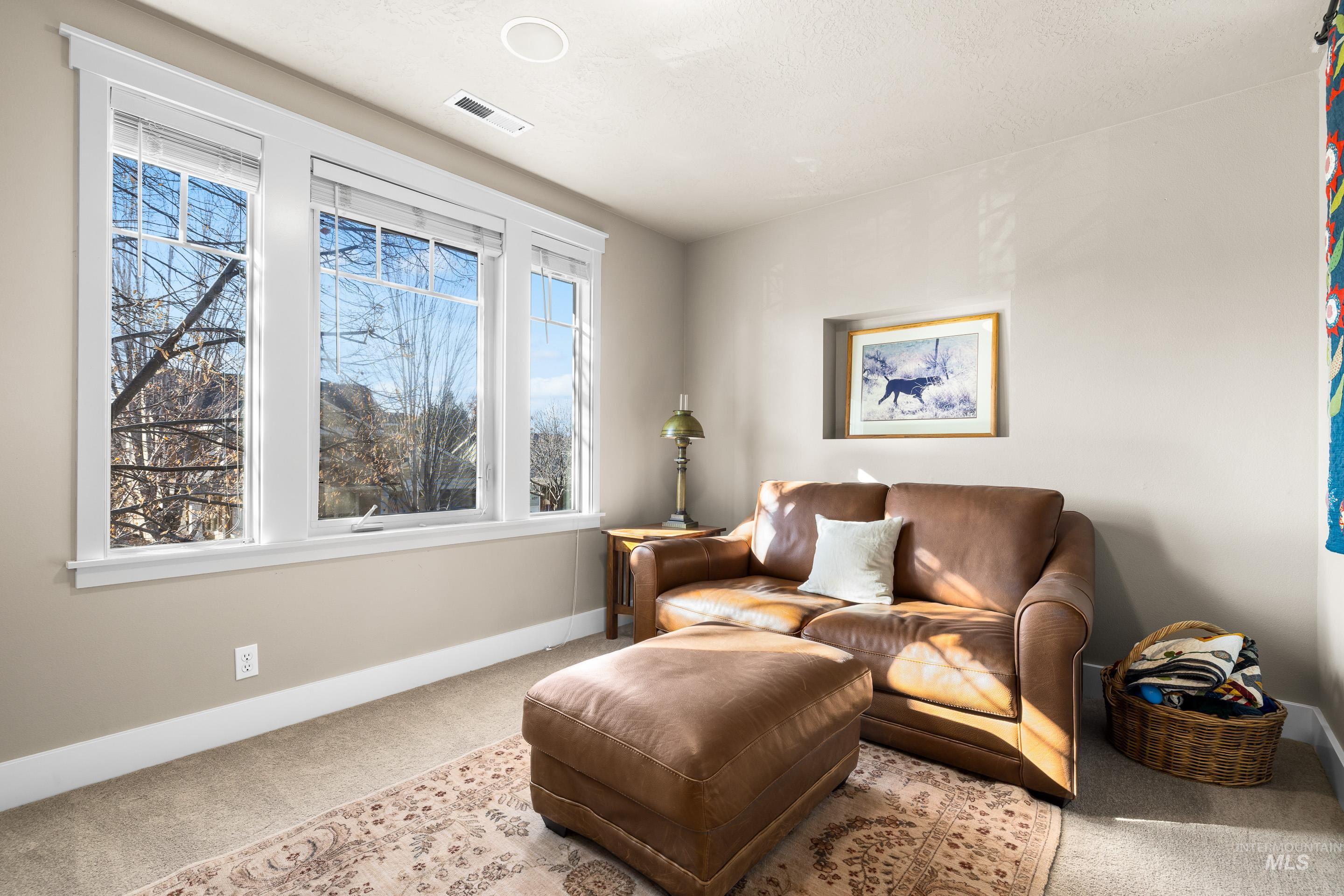 836 West Colbert Street Meridian, ID 83646 - Photo 25 of 45 Sitting room featuring carpet floors and baseboards