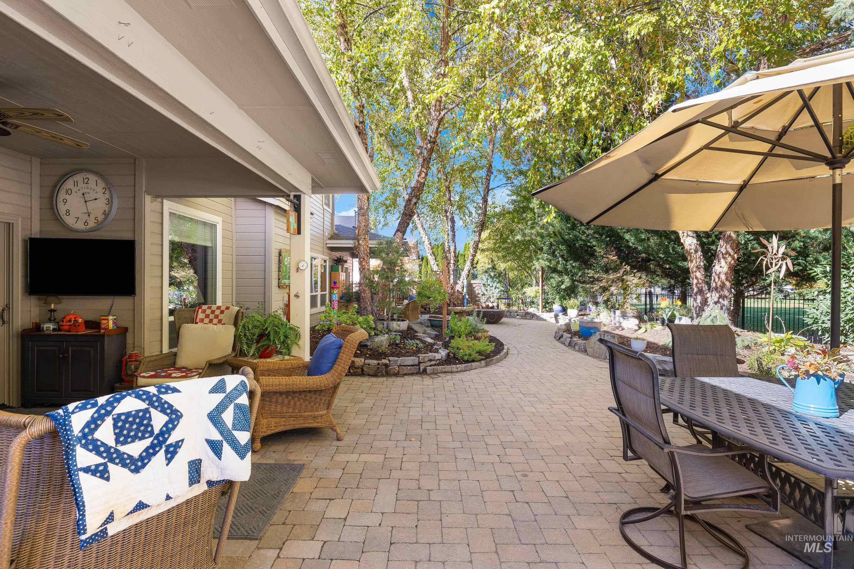 836 West Colbert Street Meridian, ID 83646 - Photo 39 of 45 View of patio with ceiling fan and outdoor dining space
