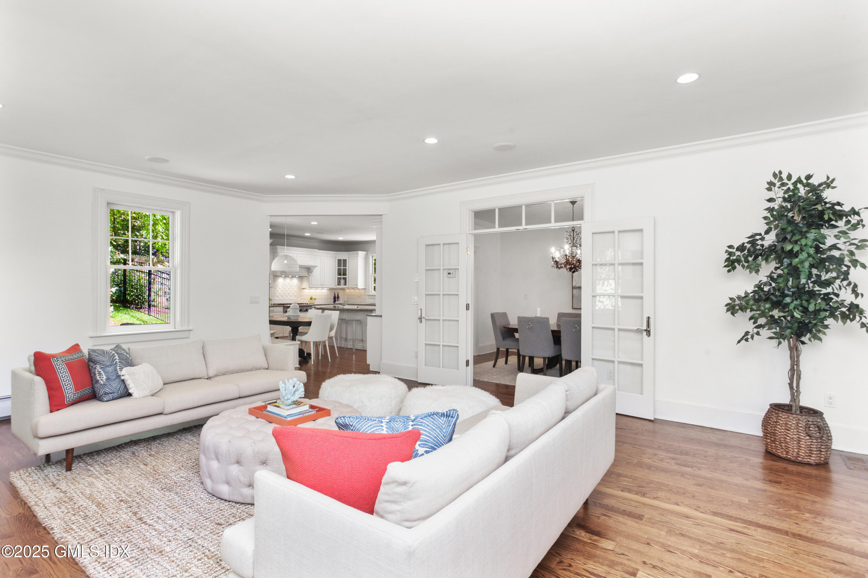 29 Weston Hill Road Riverside, CT 06878 - Photo 6 of 23 a living room with furniture and a potted plant