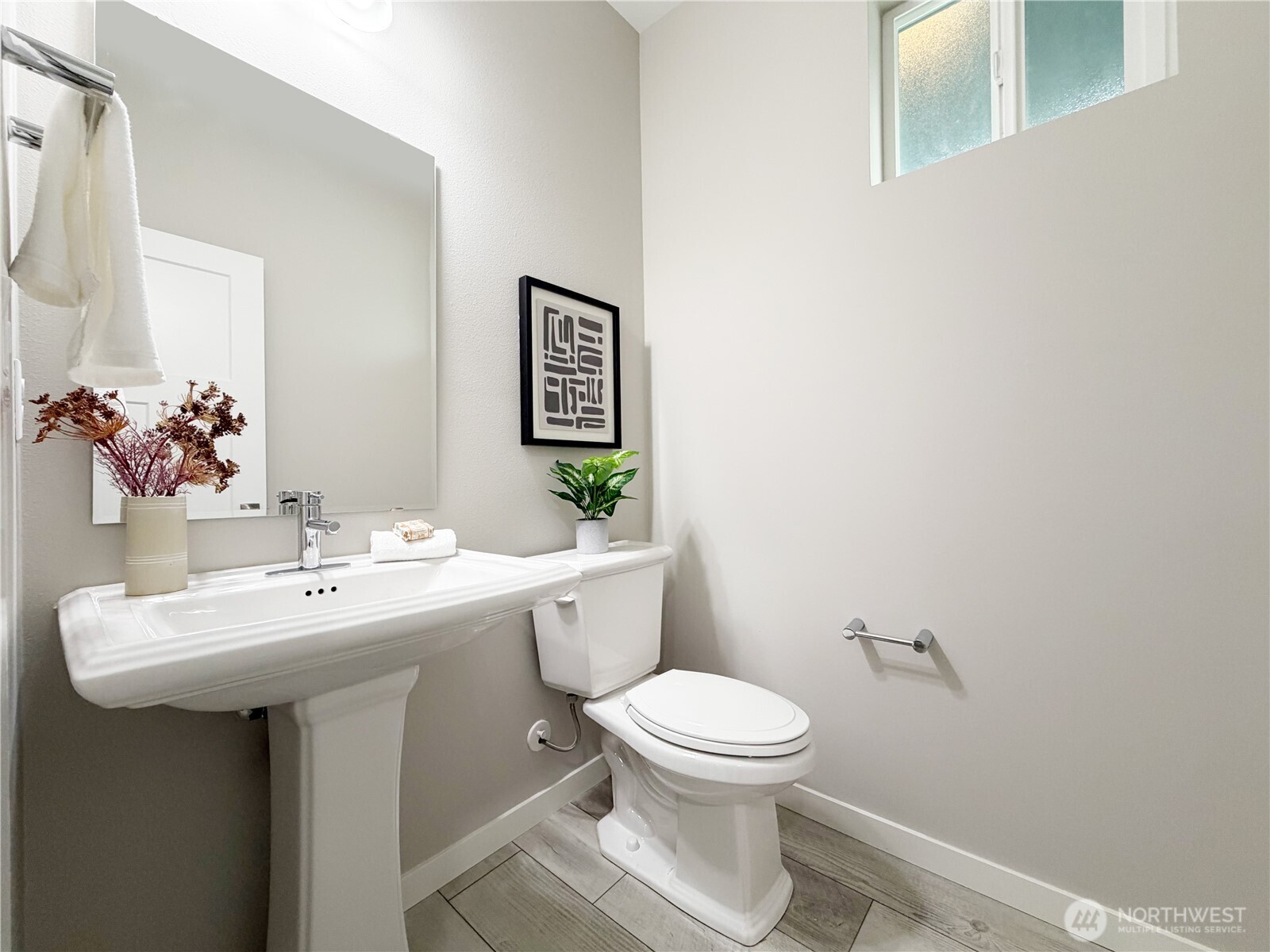 22724 41st Drive Southeast Bothell, WA 98021 - Photo 21 of 40 a bathroom with a sink mirror and toilet