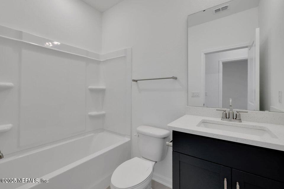 36 Thurnham Lane St. Augustine, FL 32092 - Photo 11 of 15 a bathroom with a sink toilet tub and shower
