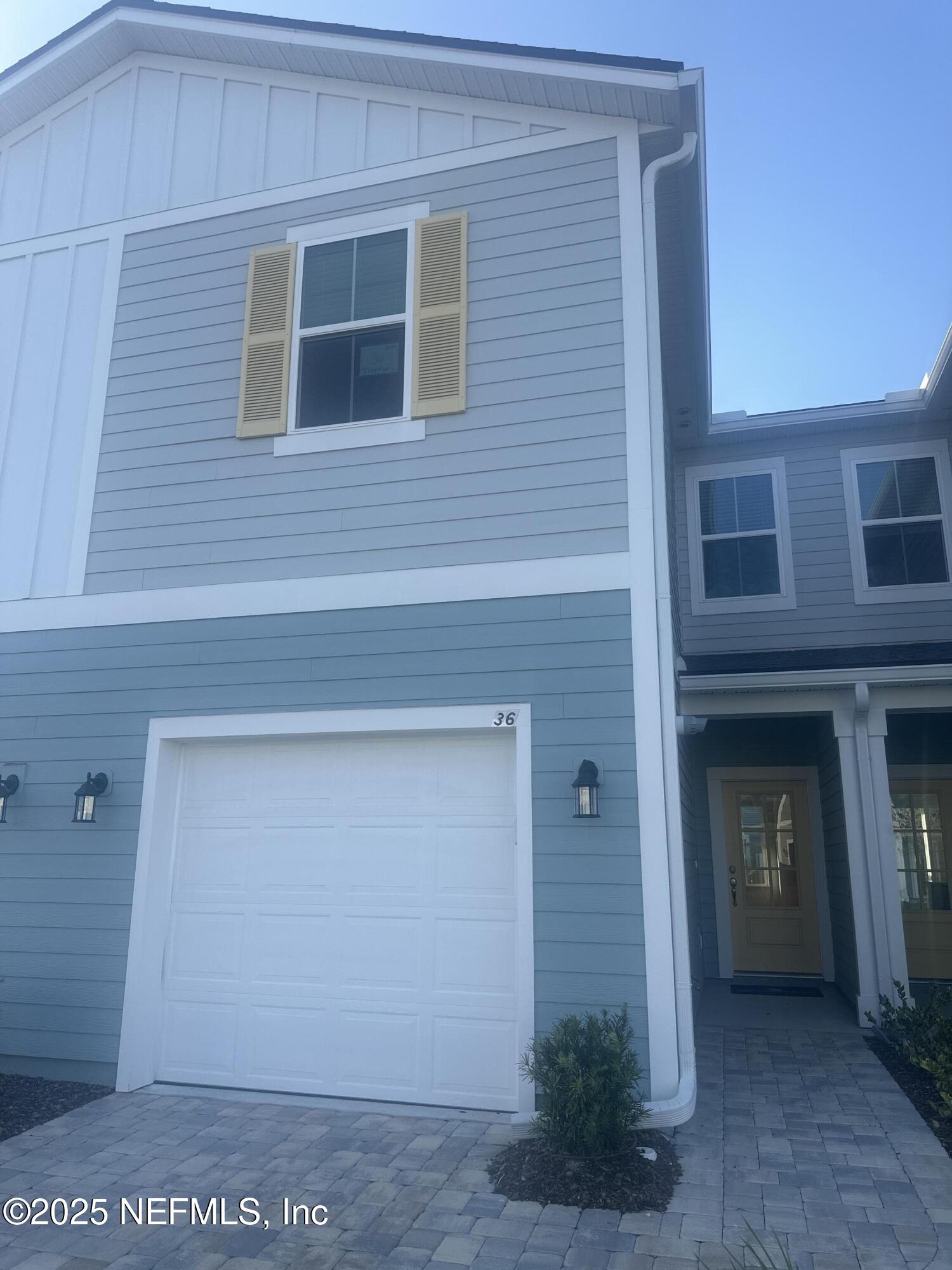 36 Thurnham Lane St. Augustine, FL 32092 - Photo 15 of 15 a front view of a house with a yard