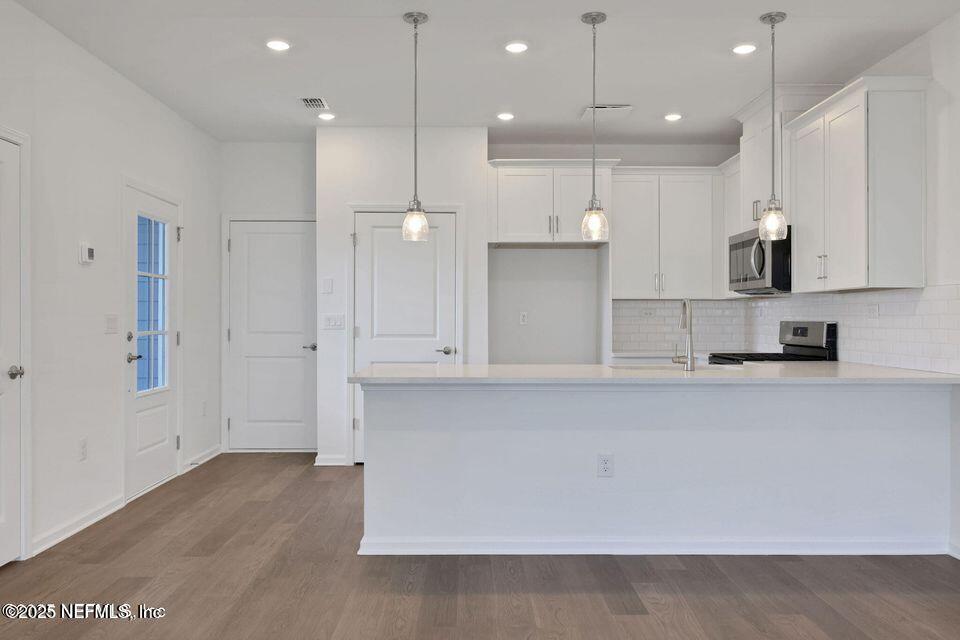 36 Thurnham Lane St. Augustine, FL 32092 - Photo 2 of 15 a view of kitchen with wooden floor