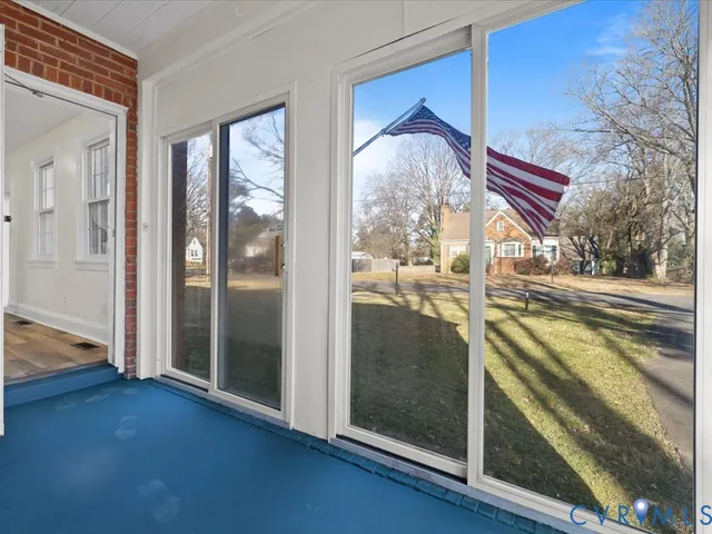 a view of a living room and bathroom