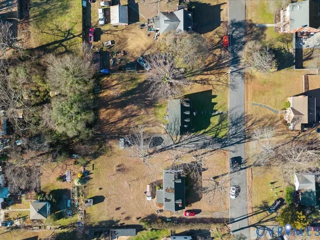 a view of building along with road and trees