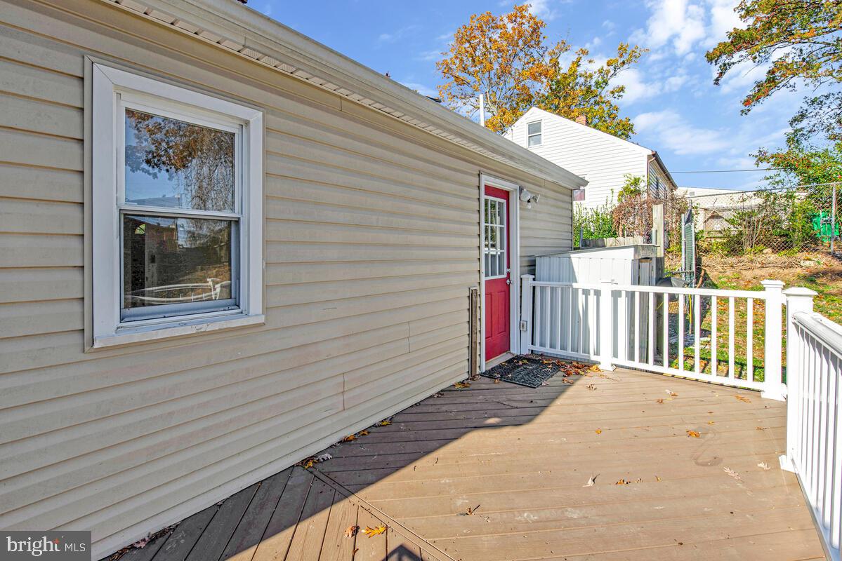7712 Frederick Road Hyattsville, MD 20784 - Photo 24 of 30 a view of a house with a small yard
