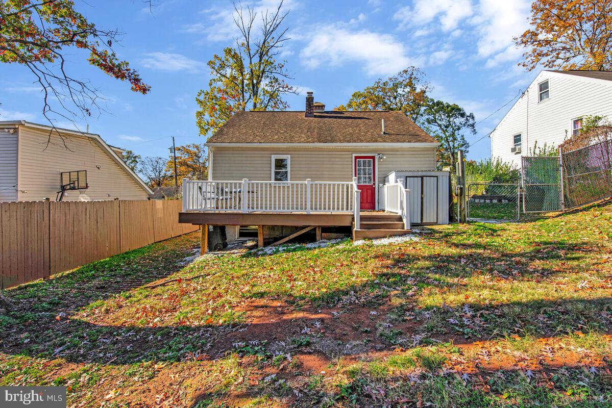 7712 Frederick Road Hyattsville, MD 20784 - Photo 26 of 30 a front view of a house with garden