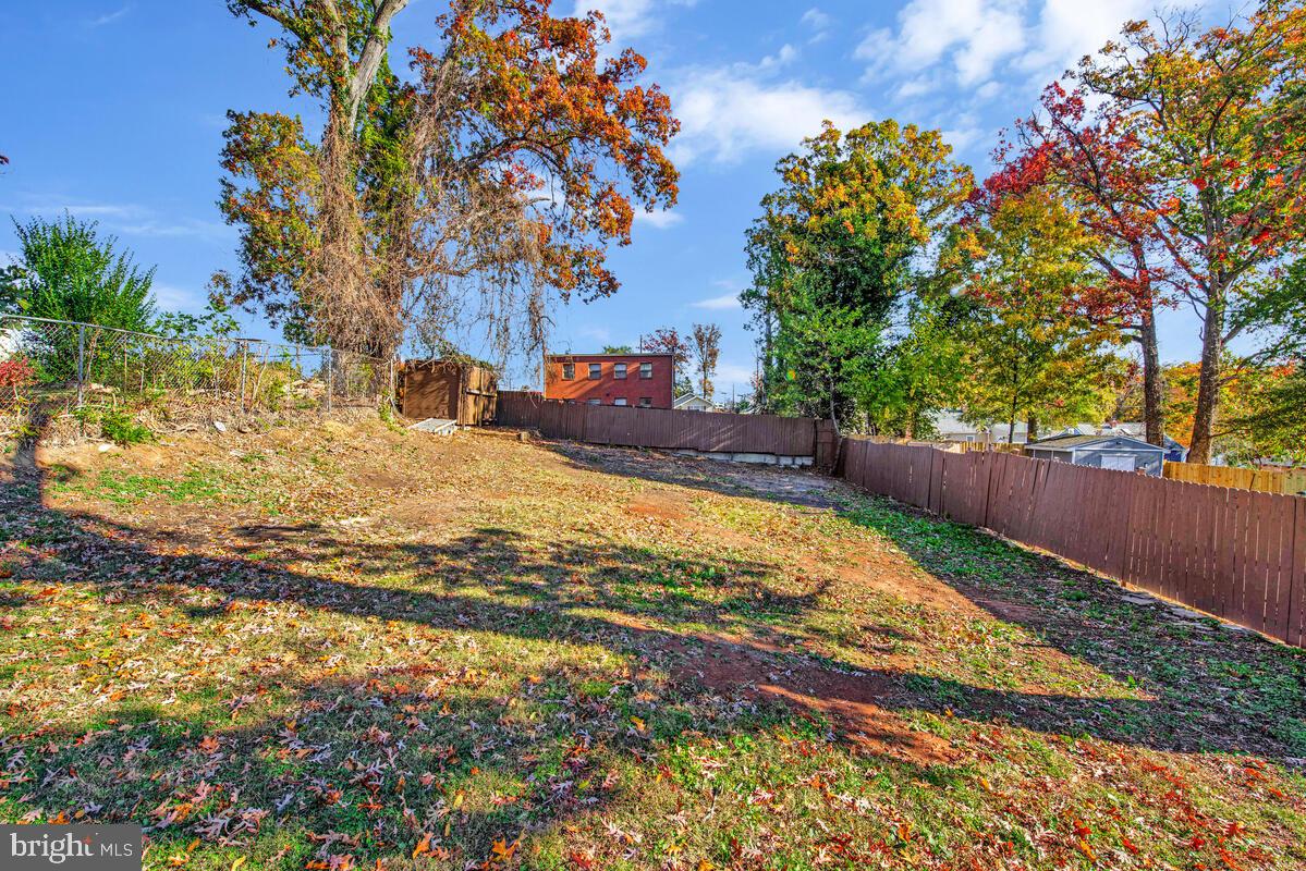7712 Frederick Road Hyattsville, MD 20784 - Photo 30 of 30 a view of a yard with wooden fence