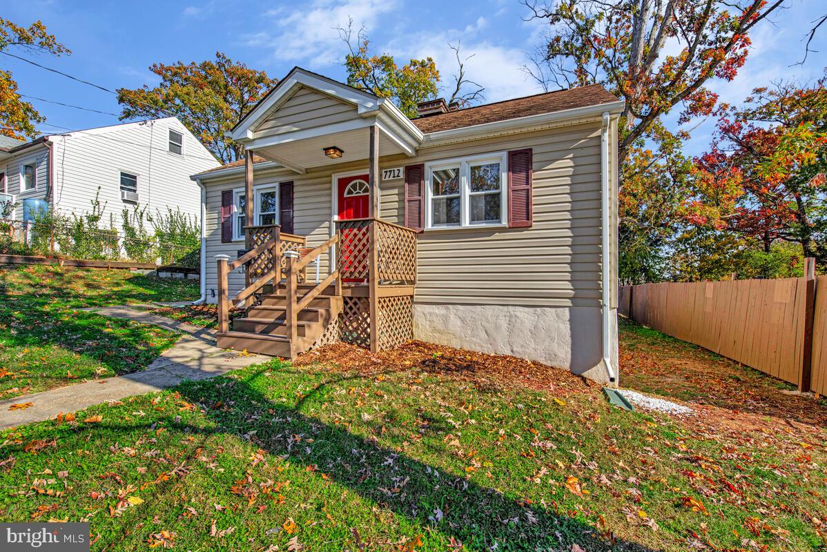 7712 Frederick Road Hyattsville, MD 20784 - Photo 3 of 30 a view of a back yard of the house