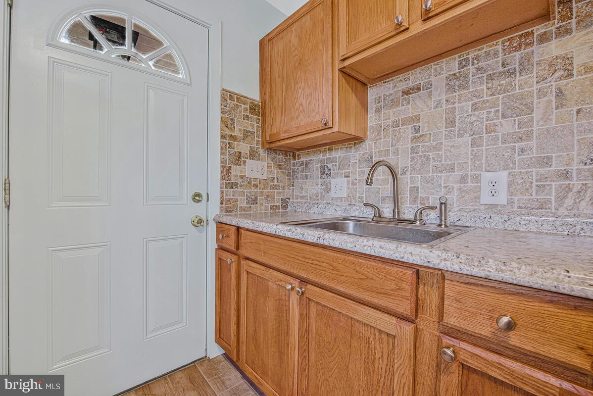 7712 Frederick Road Hyattsville, MD 20784 - Photo 8 of 30 a close view of a sink and cabinets