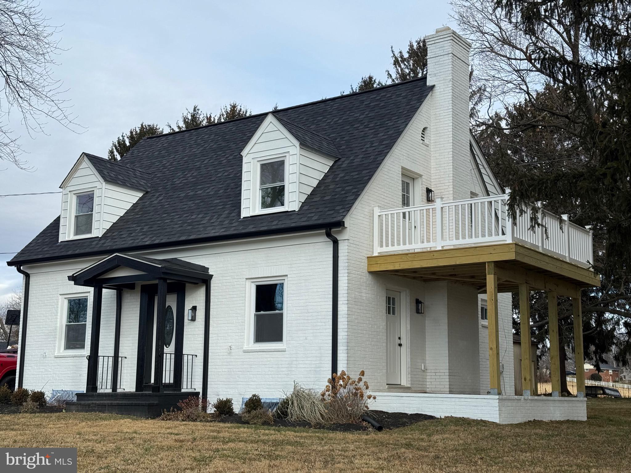 a view of a house with a porch