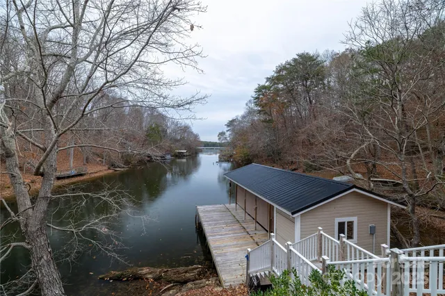 a aerial view of a house with a yard