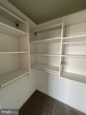 a view of a room with rack on the wall