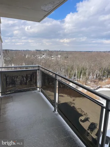 a view of balcony with furniture