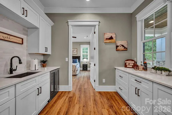 a view of a kitchen from the hallway