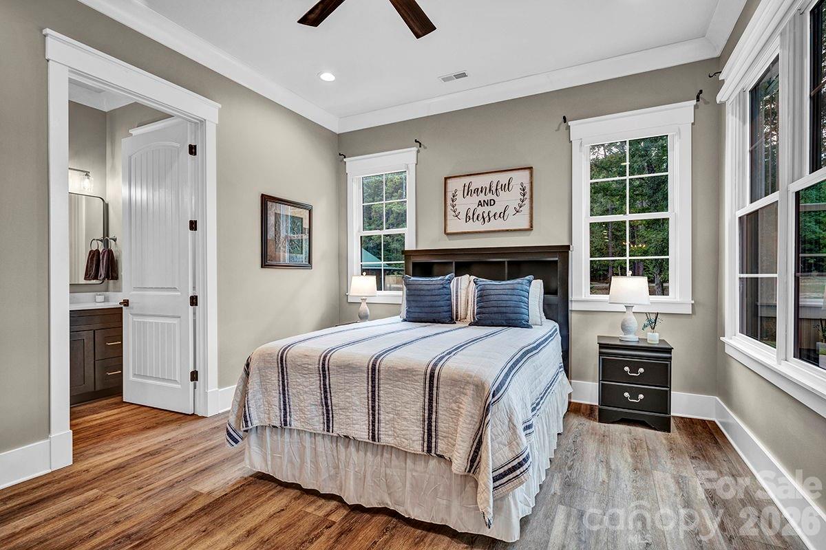 1619 Ellis Belk Road Monroe, NC 28112 - Photo 15 of 47 a bedroom with a large bed and a window