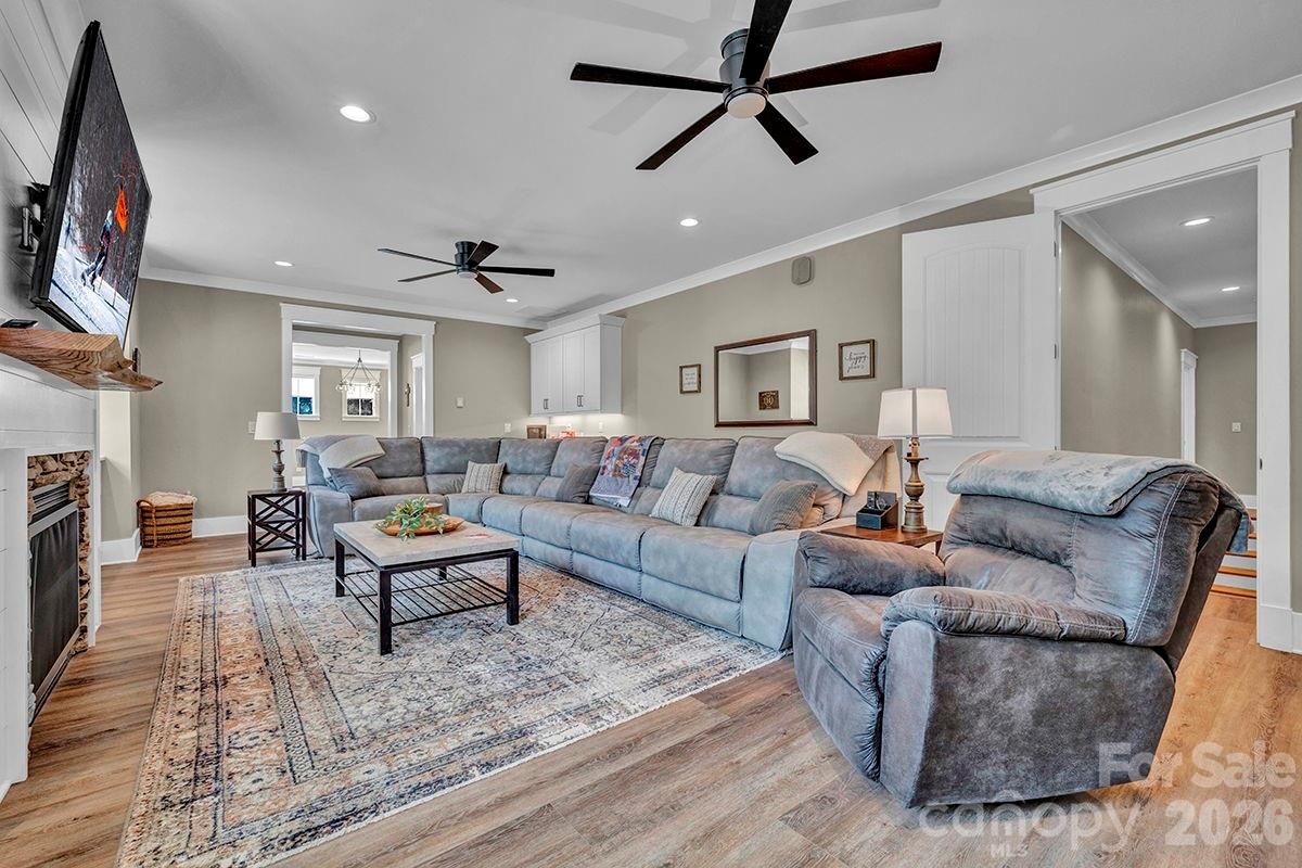 1619 Ellis Belk Road Monroe, NC 28112 - Photo 19 of 47 a living room with furniture and a fireplace