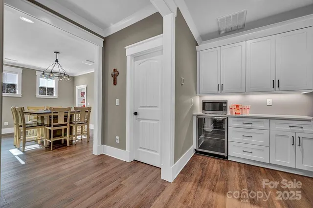 a spacious bedroom with a bed and a window