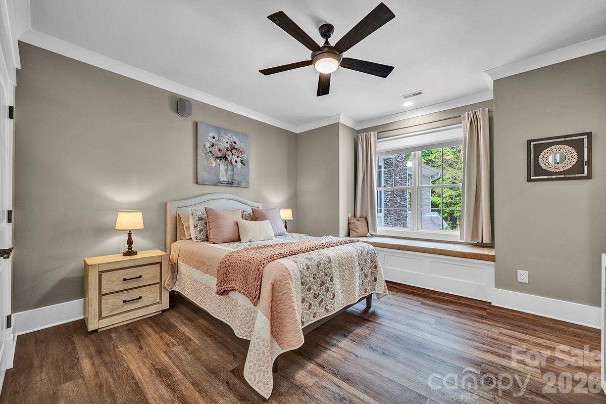 1619 Ellis Belk Road Monroe, NC 28112 - Photo 21 of 47 a spacious bedroom with a bed and a window