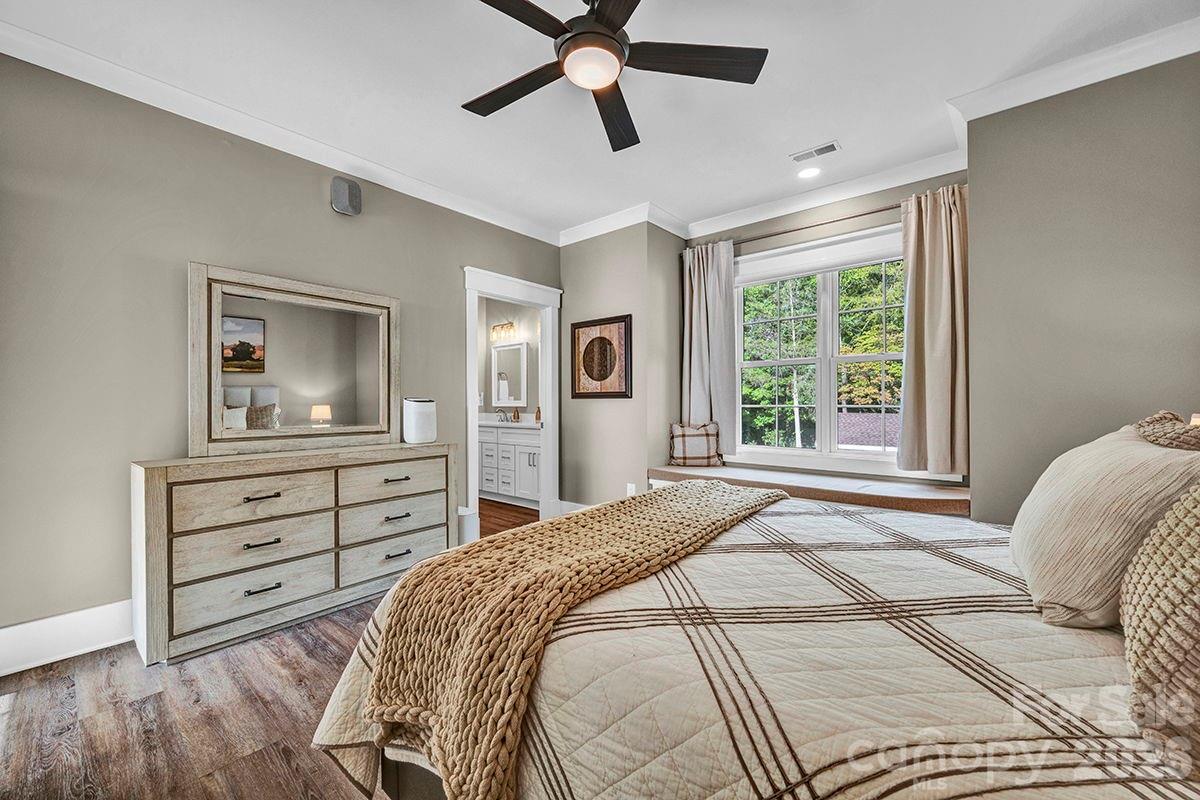 1619 Ellis Belk Road Monroe, NC 28112 - Photo 22 of 47 a bedroom with a bed and a dresser