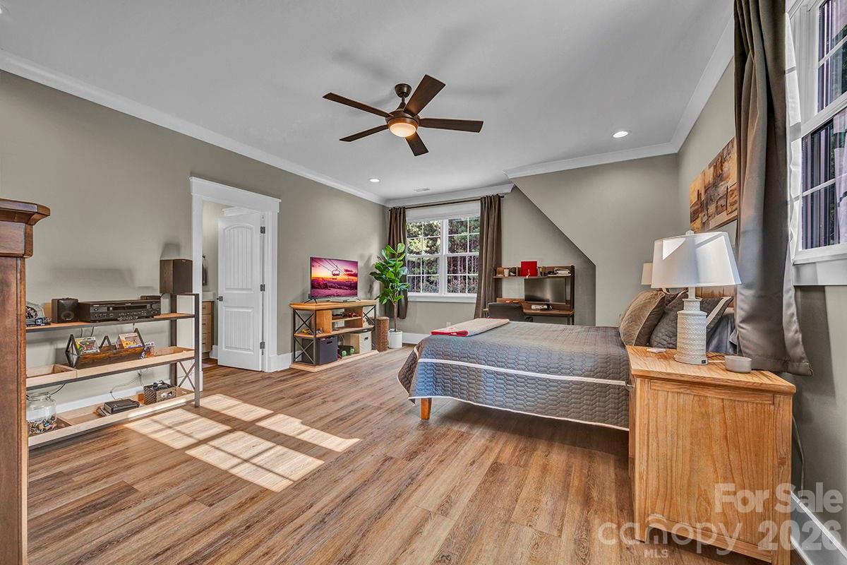 1619 Ellis Belk Road Monroe, NC 28112 - Photo 23 of 47 a living room with furniture and a flat screen tv