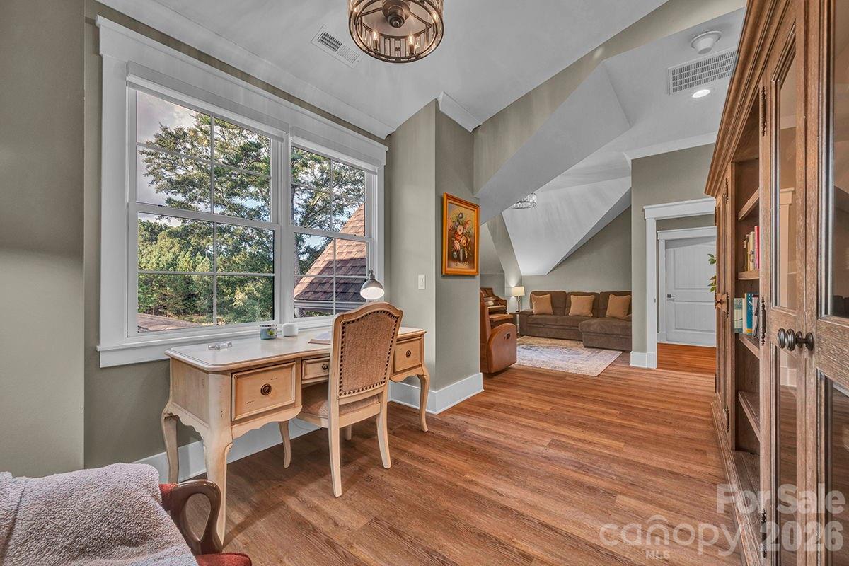 1619 Ellis Belk Road Monroe, NC 28112 - Photo 24 of 47 a dining room with wooden floor and a rug