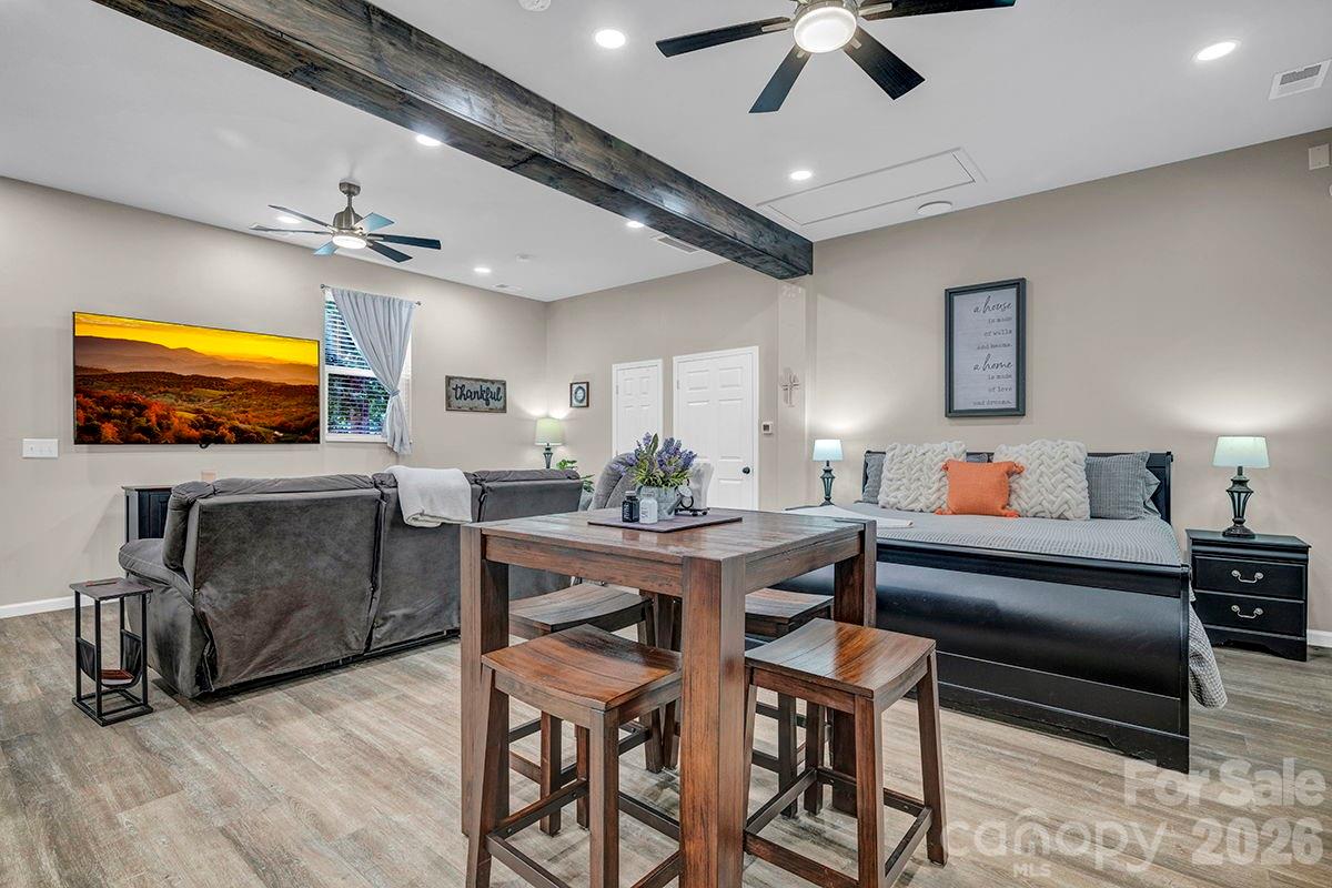 1619 Ellis Belk Road Monroe, NC 28112 - Photo 29 of 47 a living room with furniture and a flat screen tv
