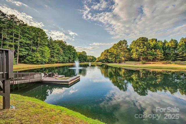 an aerial view of residential house with outdoor space and river