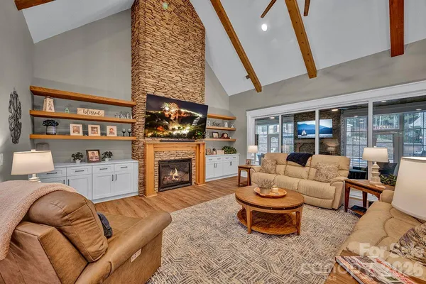 a kitchen with stainless steel appliances granite countertop lots of counter space sink and cabinets