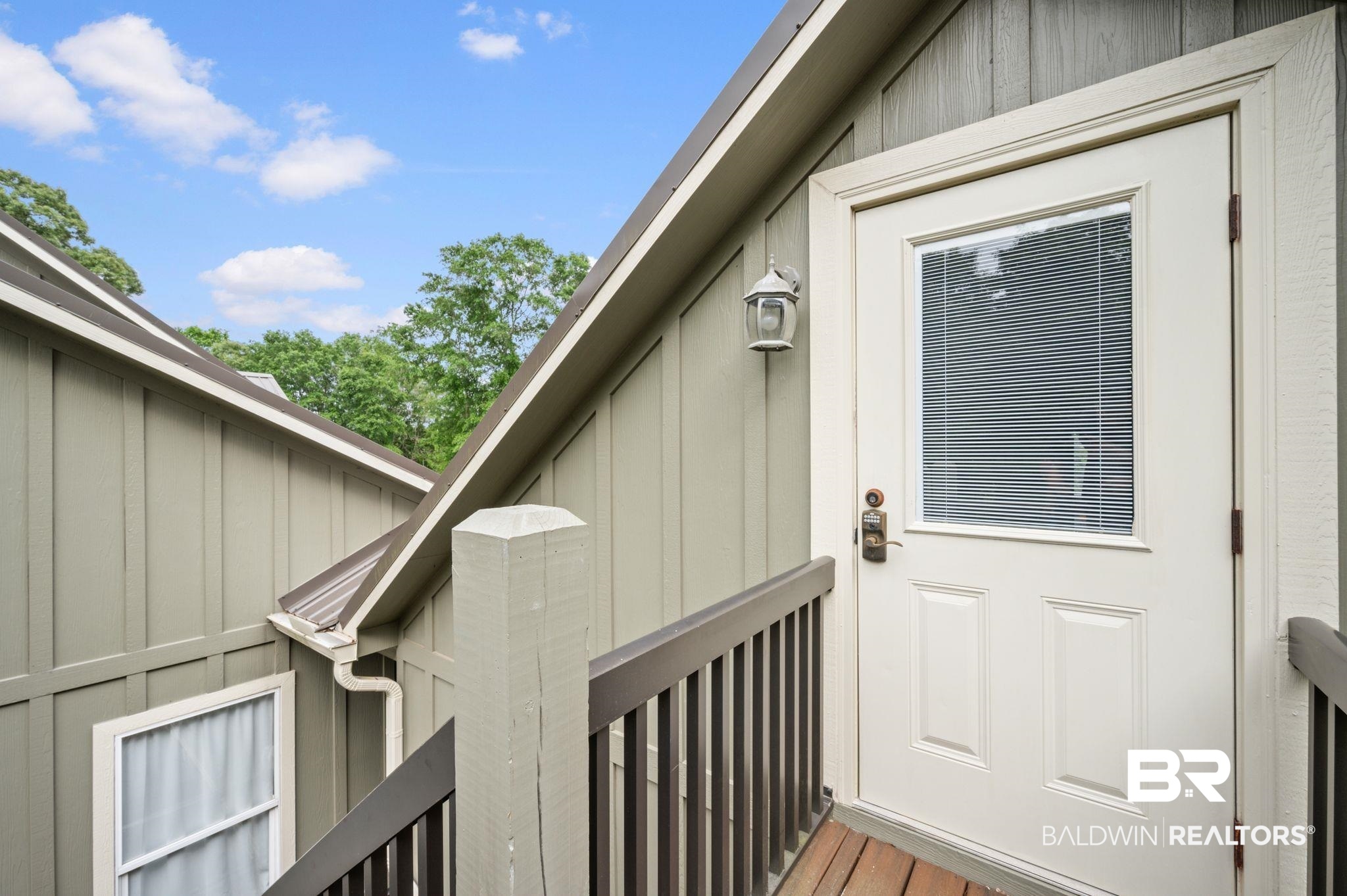 14591 Styx River Road Stapleton, AL 36578 - Photo 26 of 47 Entrance to property with board and batten siding