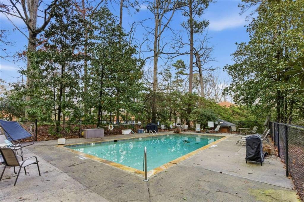 1010 Scott Boulevard, Unit B1 Decatur, GA 30030 - Photo 19 of 20 a view of backyard with seating area and trees