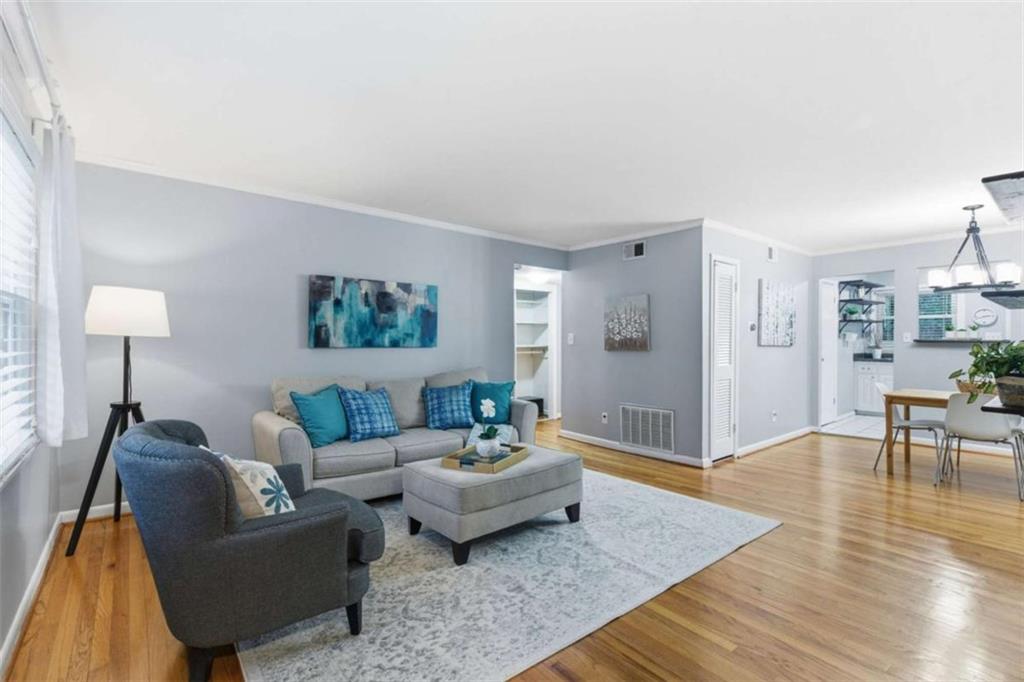 1010 Scott Boulevard, Unit B1 Decatur, GA 30030 - Photo 7 of 20 a living room with furniture and a wooden floor
