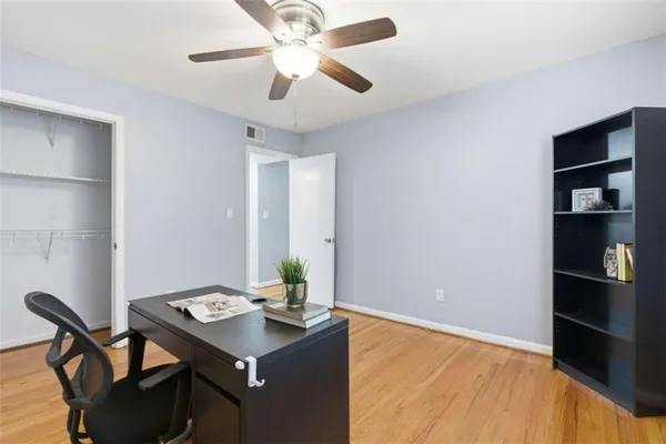 a view of a workspace with furniture