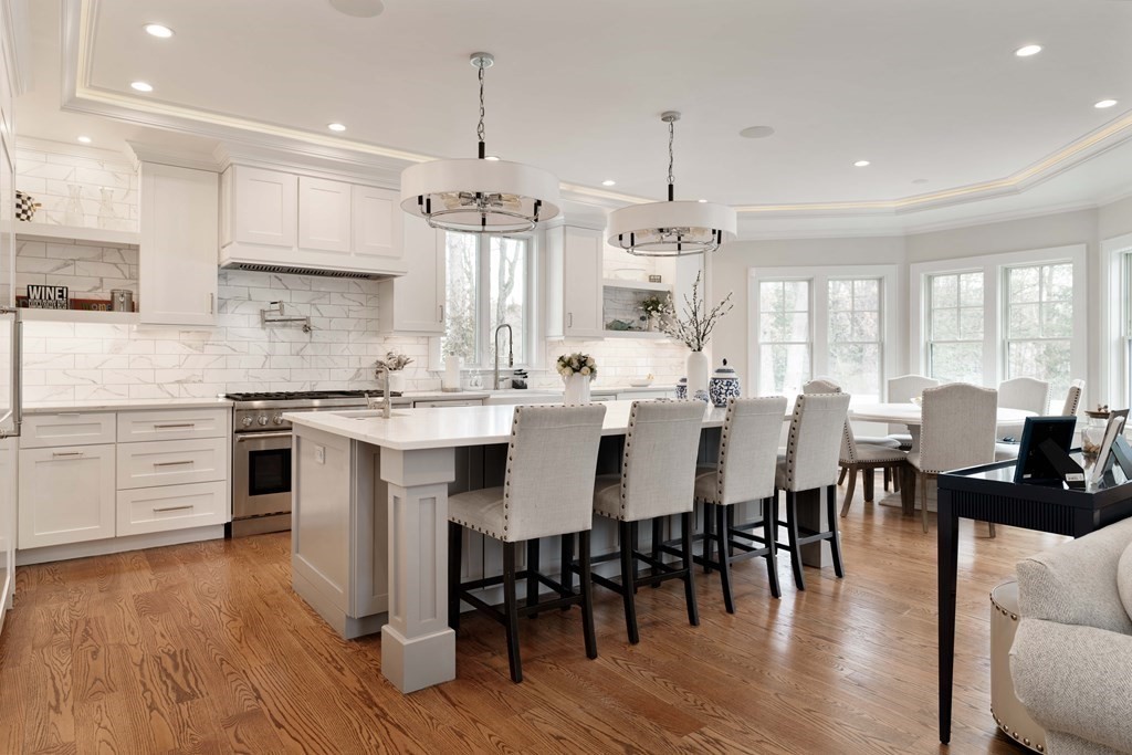 700 Chestnut Street Needham, MA 02492 - Photo 11 of 41 a large kitchen with a table and chairs