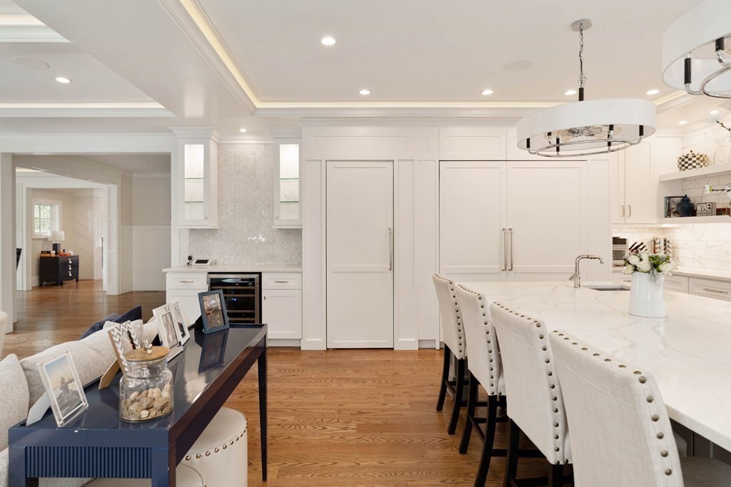 700 Chestnut Street Needham, MA 02492 - Photo 13 of 41 a view of kitchen with furniture and wooden floor