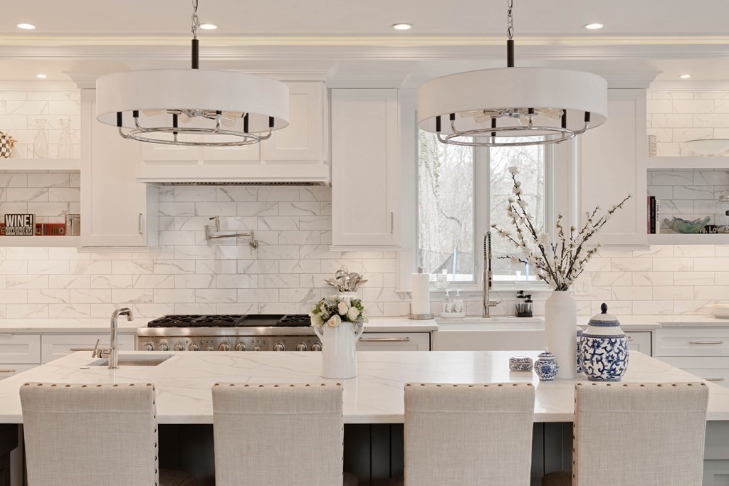 700 Chestnut Street Needham, MA 02492 - Photo 14 of 41 a kitchen with stainless steel appliances a sink stove and cabinets
