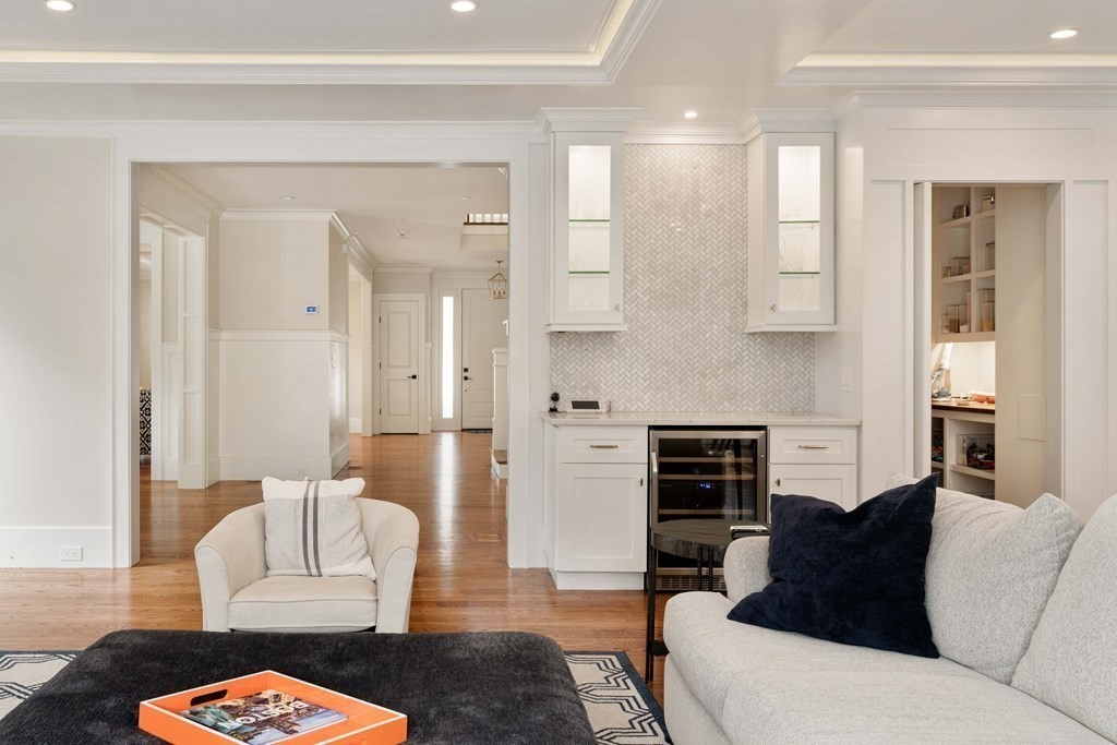 700 Chestnut Street Needham, MA 02492 - Photo 21 of 41 a living room with furniture and a fireplace