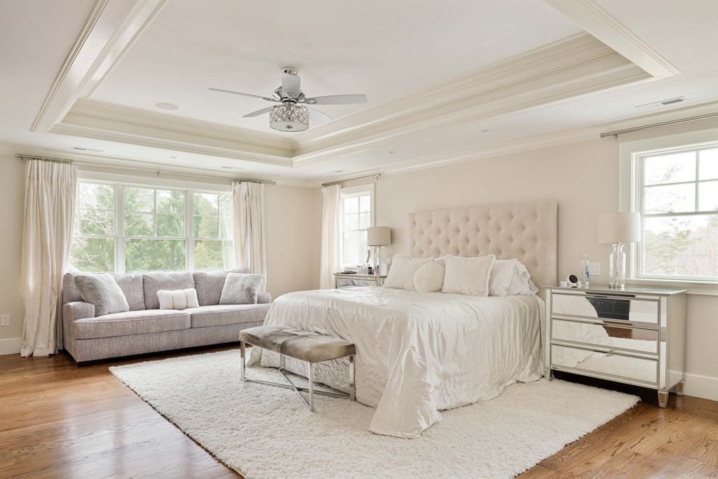 700 Chestnut Street Needham, MA 02492 - Photo 25 of 41 a bedroom with a bed and a couch