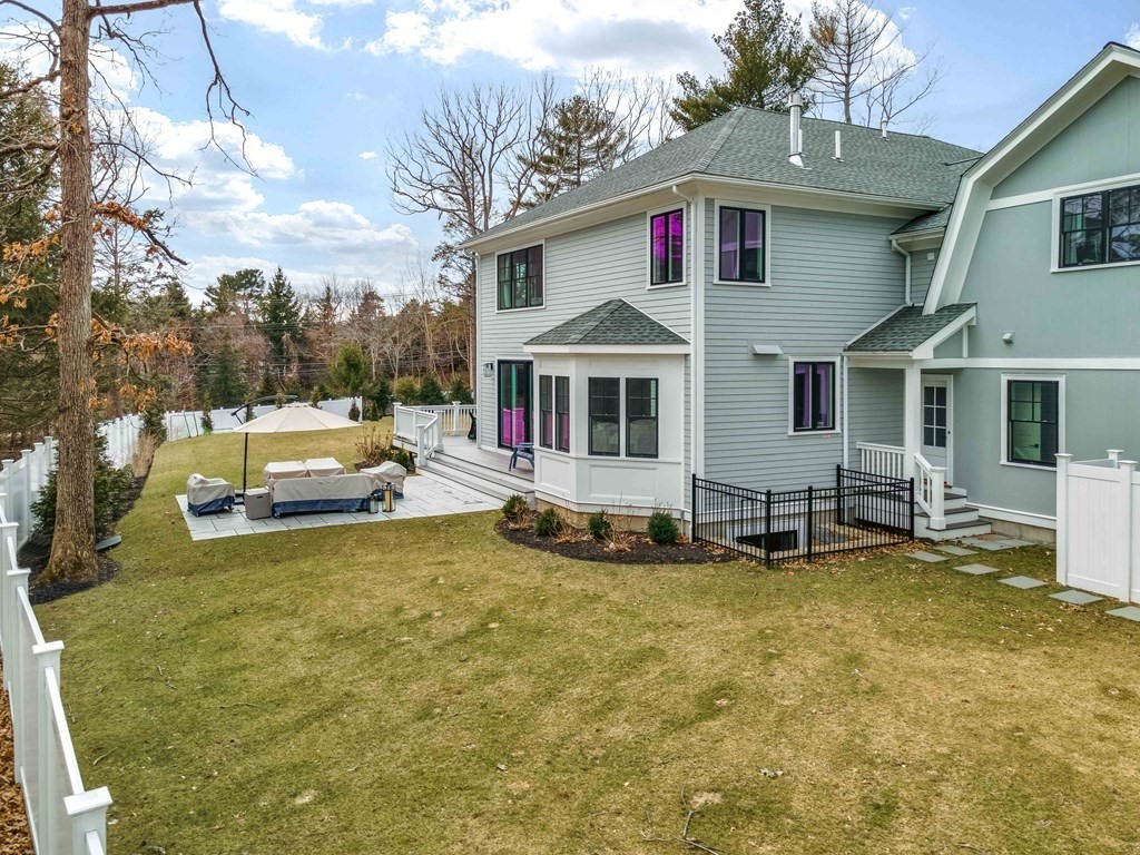 700 Chestnut Street Needham, MA 02492 - Photo 3 of 41 a view of a house with swimming pool and sitting area