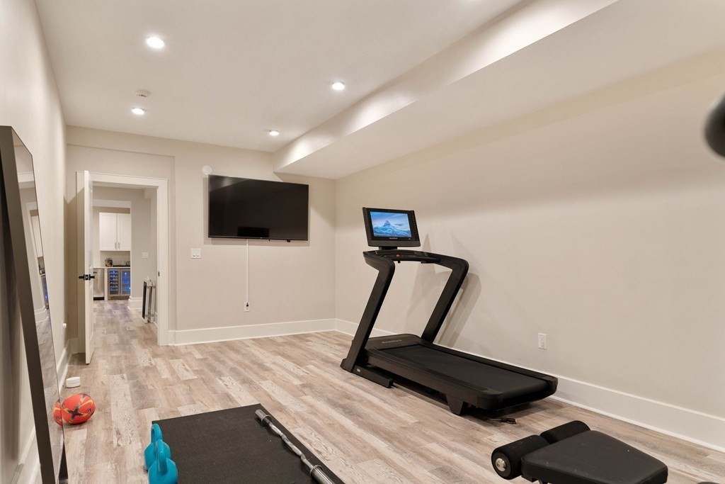 700 Chestnut Street Needham, MA 02492 - Photo 35 of 41 a living room with furniture and a flat screen tv
