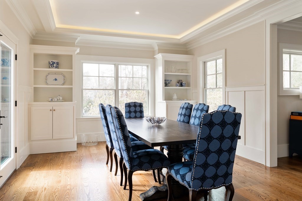 700 Chestnut Street Needham, MA 02492 - Photo 7 of 41 a view of a dining room with furniture and wooden floor