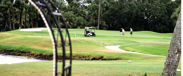 a view of a park with swings