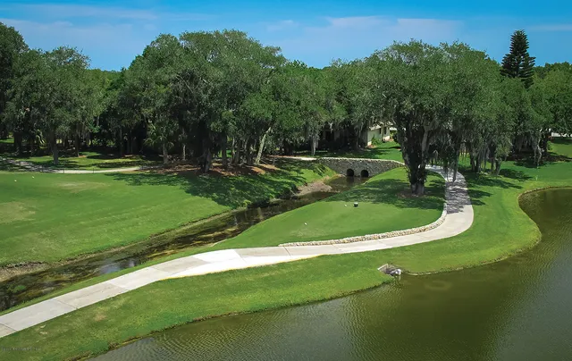 a view of a golf course with a garden