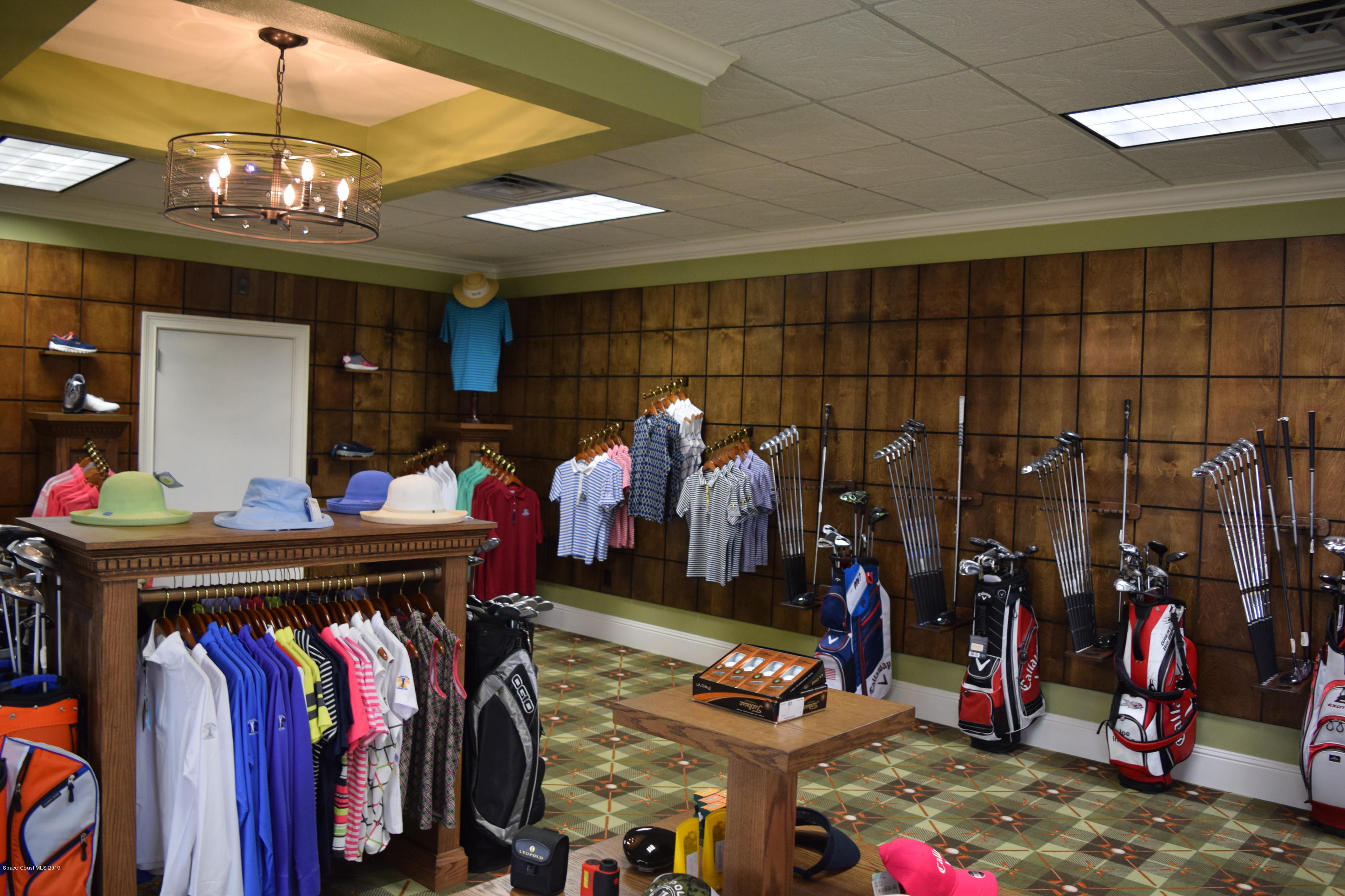 1432 Patriot Drive Melbourne, FL 32940 - Photo 9 of 17 a group of people sitting in a room