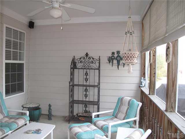 10472 Dapping Drive Raleigh, NC 27614 - Photo 10 of 12 a view of a livingroom with furniture and window
