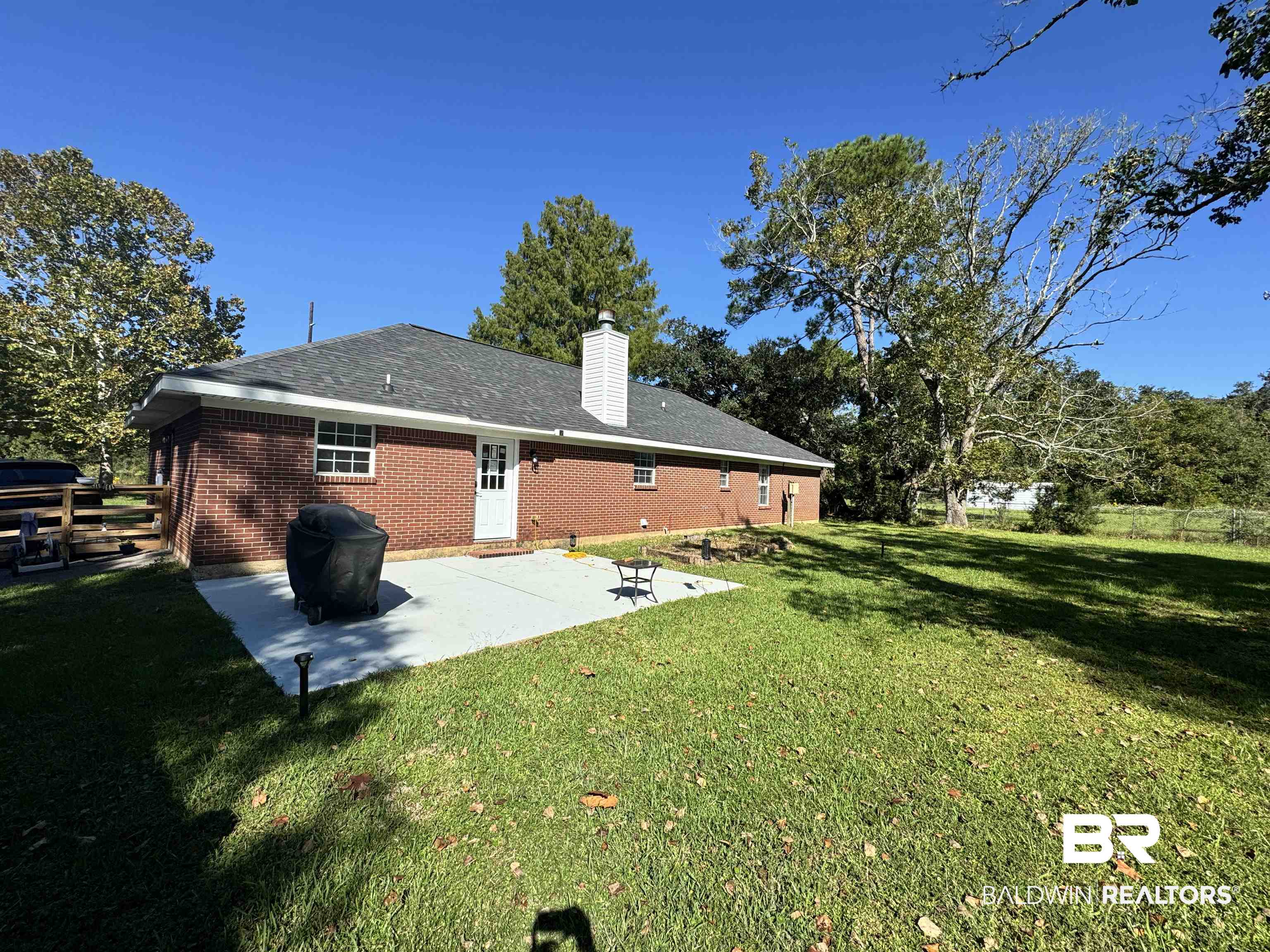 14313 Hemley Road Coden, AL 36523 - Photo 36 of 44 Back of property with a patio area and a yard